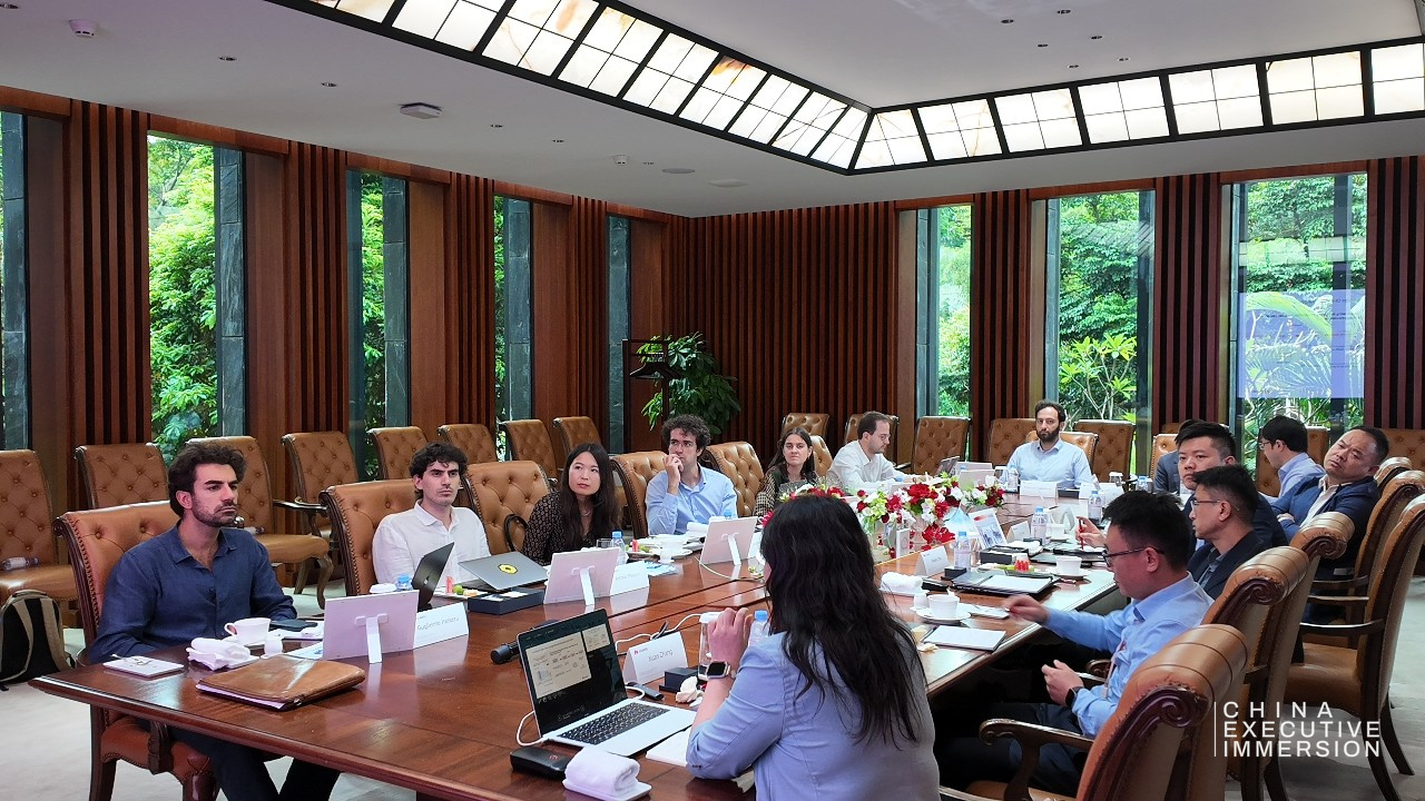 Huawei — named seats on both sides of the boardroom table — Shenzhen