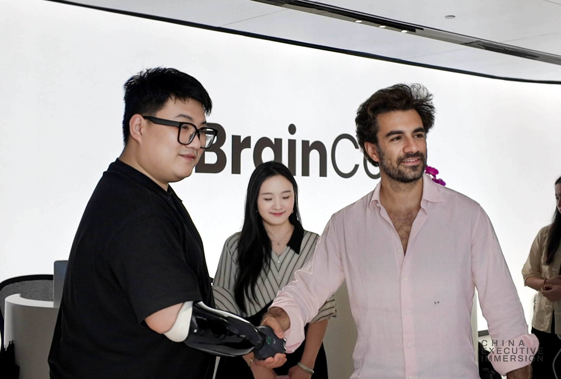BrainCo — a handshake with a brain-controlled prosthetic hand — Shanghai