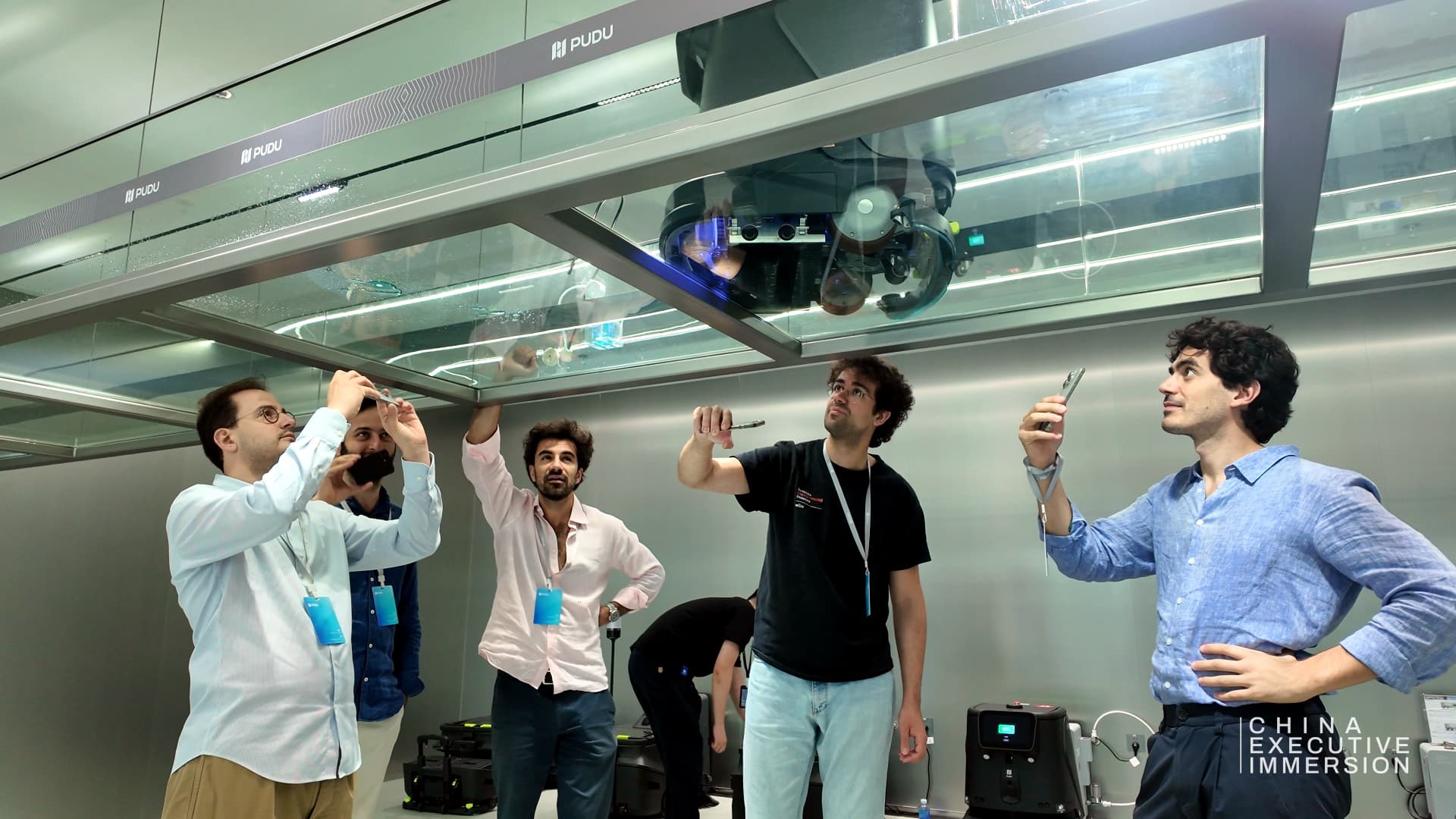 Pudu Robotics — service robots running the overhead test track in the lab — Shenzhen