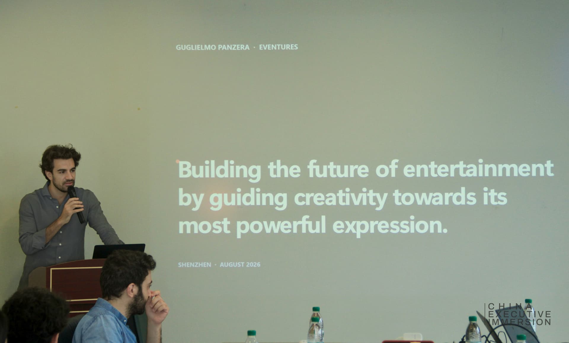 Joint session — a delegate presenting his own company to the room — Shenzhen