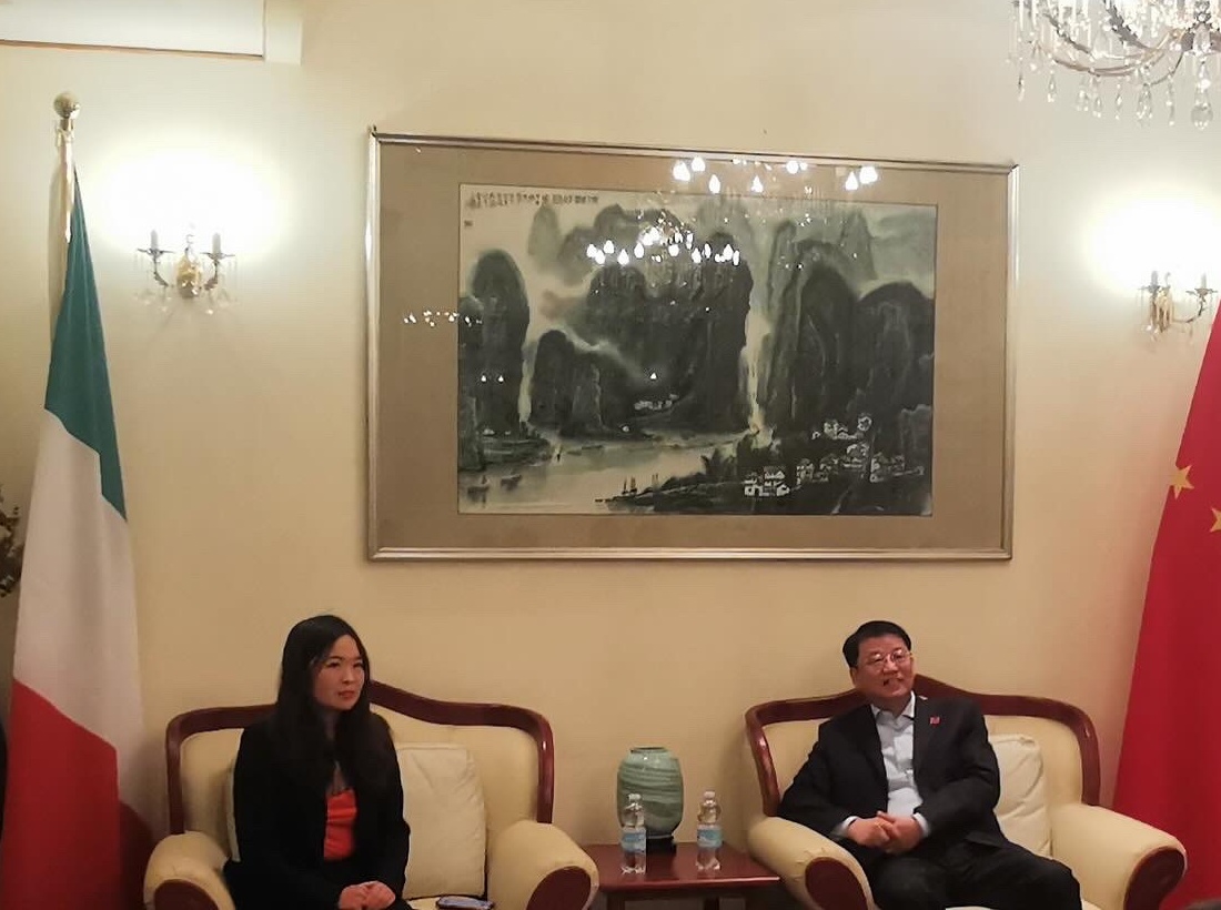 Institutional visit — delegation received at the consulate with Italy and China flags — China